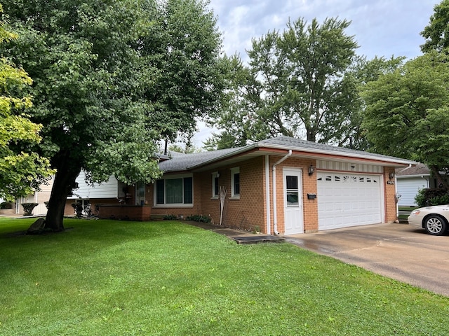 single story home featuring a front yard and a garage