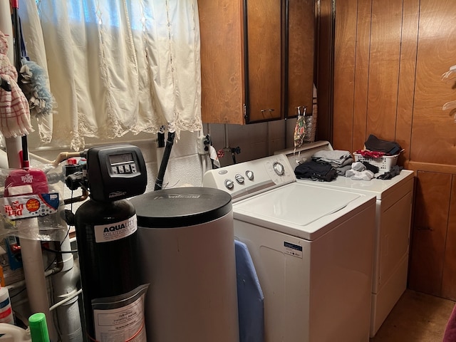 clothes washing area featuring washer and dryer