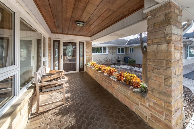 view of patio with central AC unit