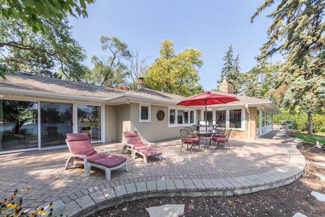 back of house with a patio area