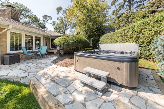 view of patio with a hot tub