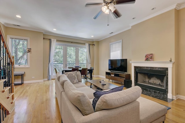 938 N Washtenaw Ave, Chicago, IL 60622 - living area with stairs, light wood-style flooring, a wealth of natural light, and baseboards