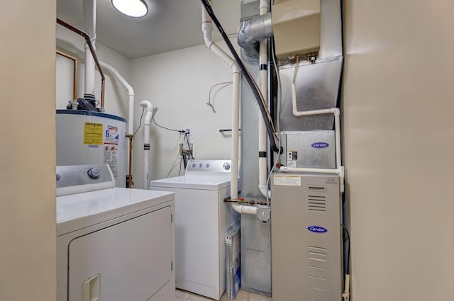 938 N Washtenaw Ave, Chicago, IL 60622 - washroom featuring laundry area, gas water heater, and washer and dryer