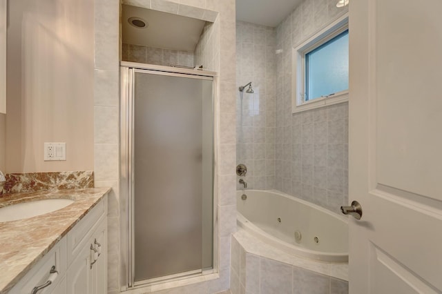 938 N Washtenaw Ave, Chicago, IL 60622 - bathroom with a jetted tub, a shower stall, and vanity