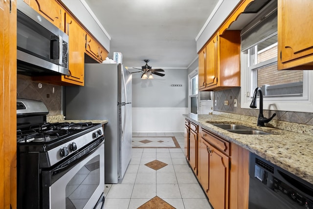 kitchen featuring light tile patterned flooring, black dishwasher, ceiling fan, white gas range oven, and decorative backsplash