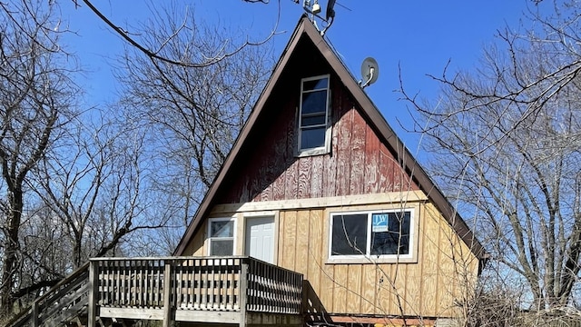 view of home's exterior featuring a deck