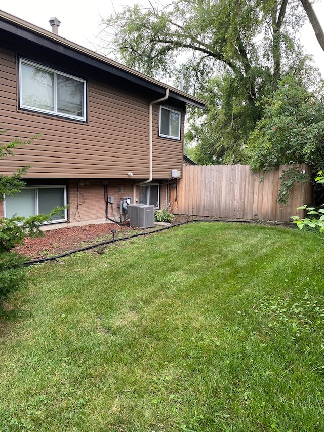 view of yard featuring central AC