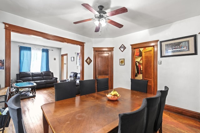 6821 S Campbell Ave, Chicago, IL 60629 - dining area featuring wood finished floors, a ceiling fan, and baseboards