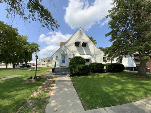 view of front of house with a front lawn