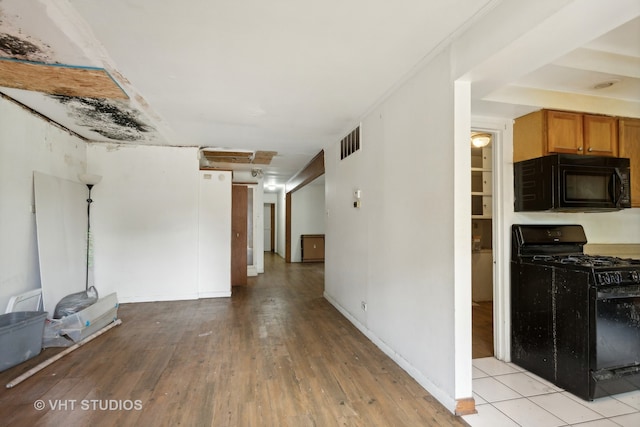 hall featuring light hardwood / wood-style flooring