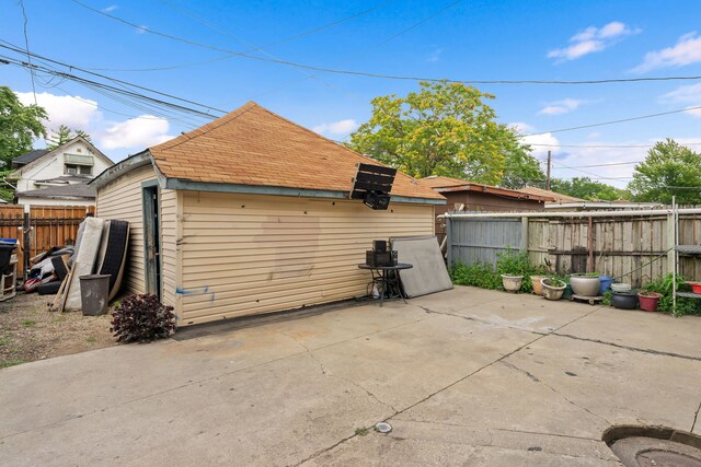 rear view of property featuring a patio