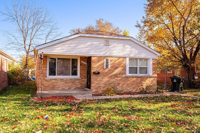 view of front of house with a front lawn