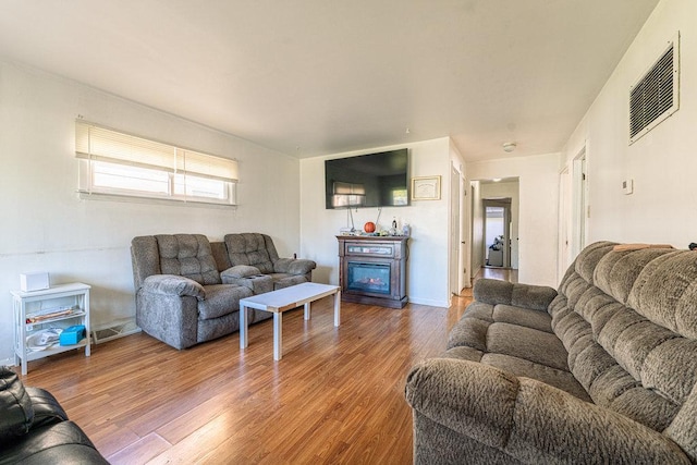 living room featuring hardwood / wood-style flooring