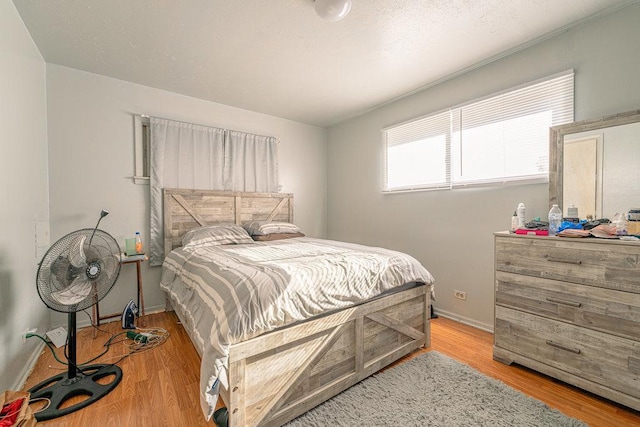 bedroom featuring light wood-type flooring