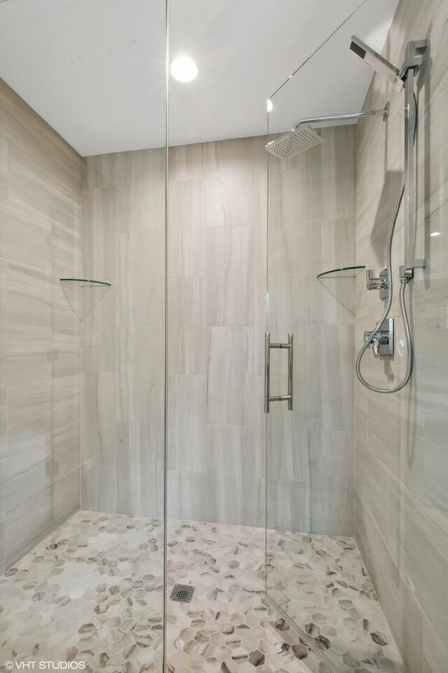 bathroom featuring an enclosed shower