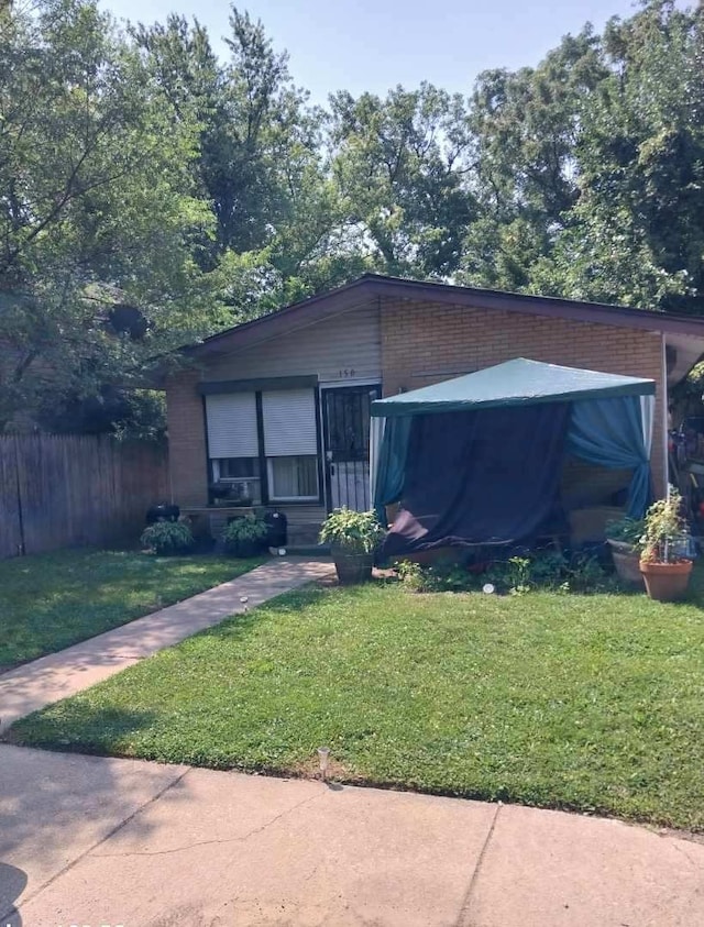 view of front of home with a front yard