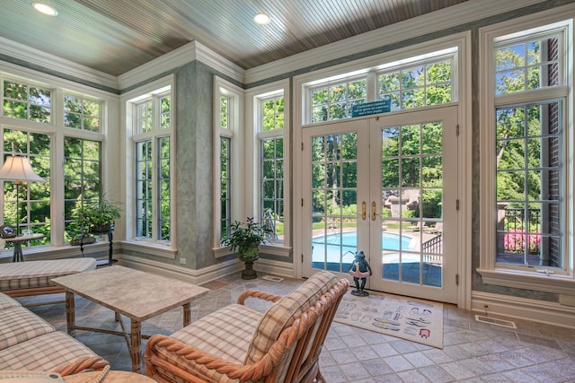 sunroom featuring french doors