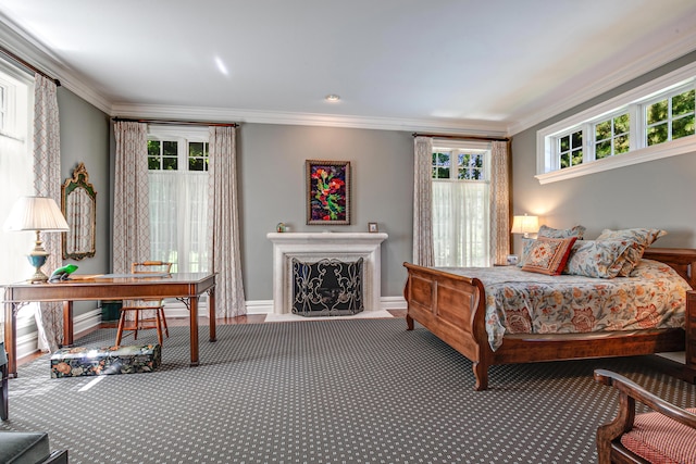 carpeted bedroom featuring multiple windows and crown molding