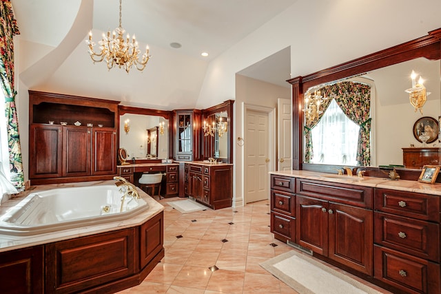 bathroom featuring tile patterned flooring, a bath, an inviting chandelier, vanity, and vaulted ceiling