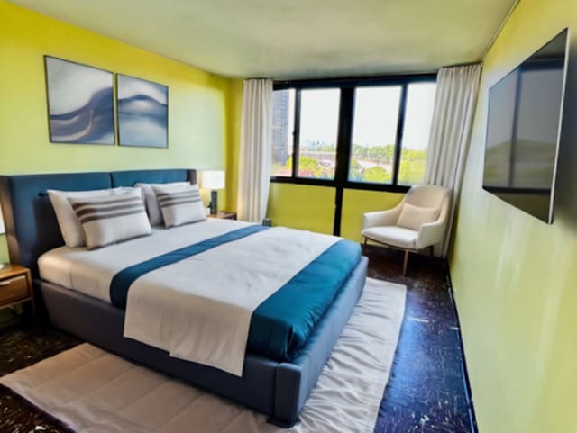 bedroom featuring floor to ceiling windows