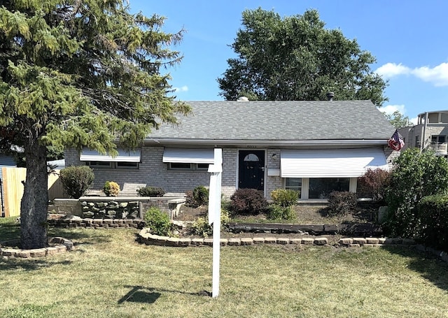 view of front of home featuring a front lawn