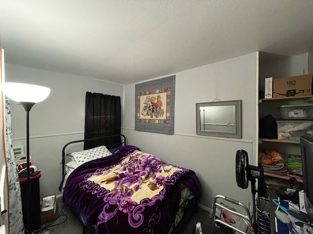 bedroom featuring a textured ceiling