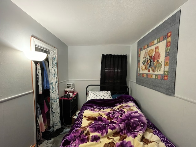 bedroom featuring a textured ceiling