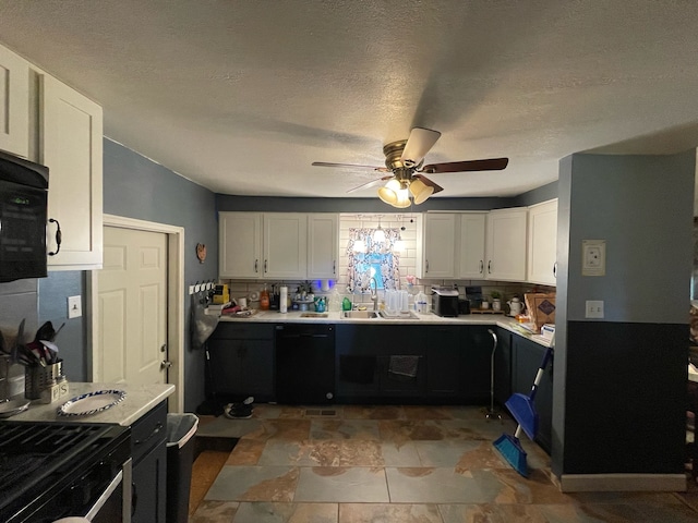 kitchen with white cabinets, backsplash, and ceiling fan