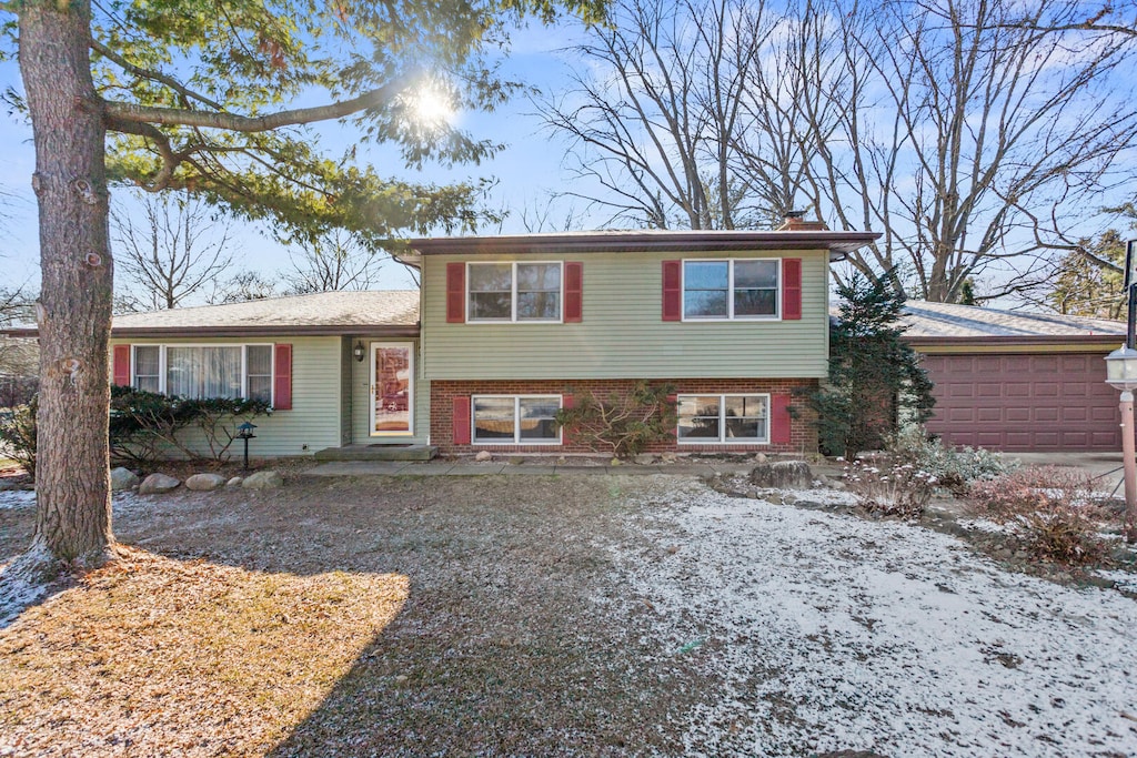 split level home with a garage