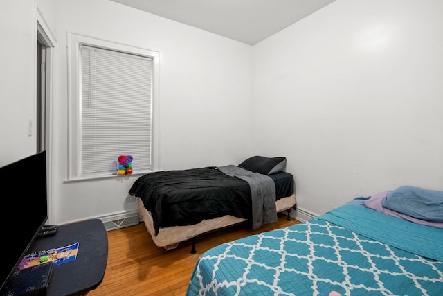 bedroom featuring hardwood / wood-style floors