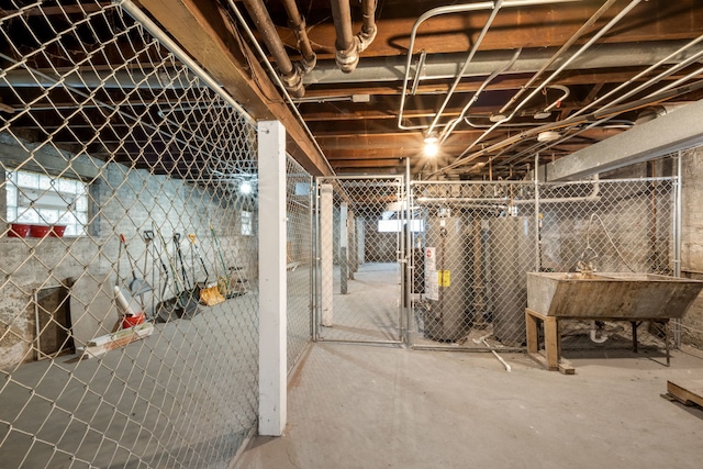 basement with sink and water heater