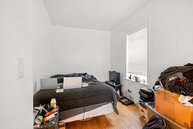 bedroom featuring hardwood / wood-style flooring