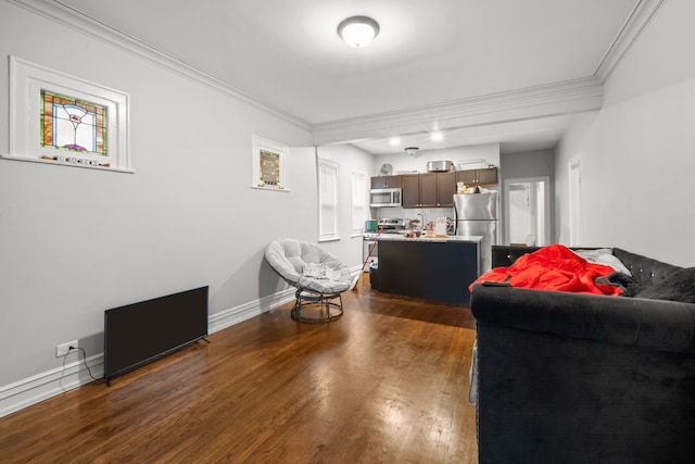 living room with dark wood-type flooring and crown molding