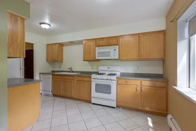 kitchen featuring sink, light tile patterned floors, white appliances, and baseboard heating