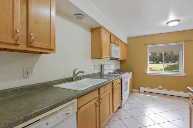 kitchen featuring light tile patterned flooring, sink, white appliances, and baseboard heating