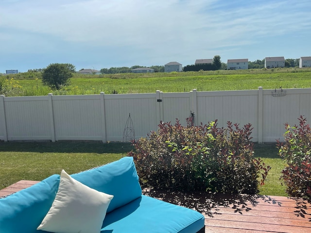 view of yard featuring a wooden deck