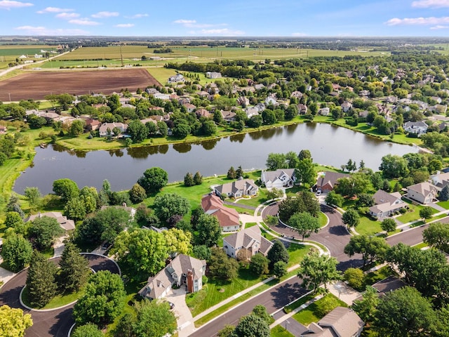 birds eye view of property featuring a residential view and a water view