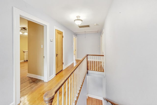 corridor featuring light hardwood / wood-style flooring