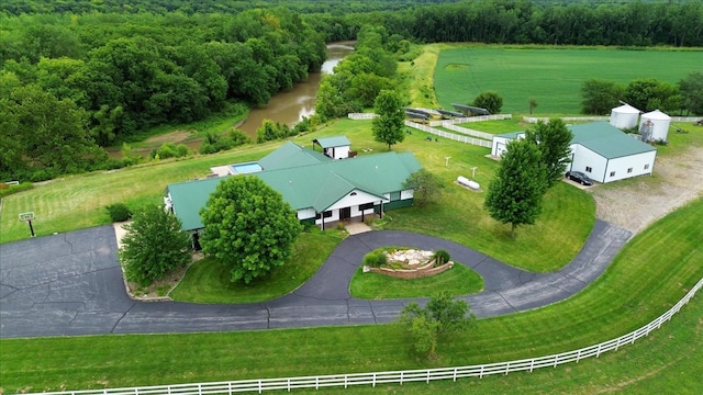 birds eye view of property featuring a rural view