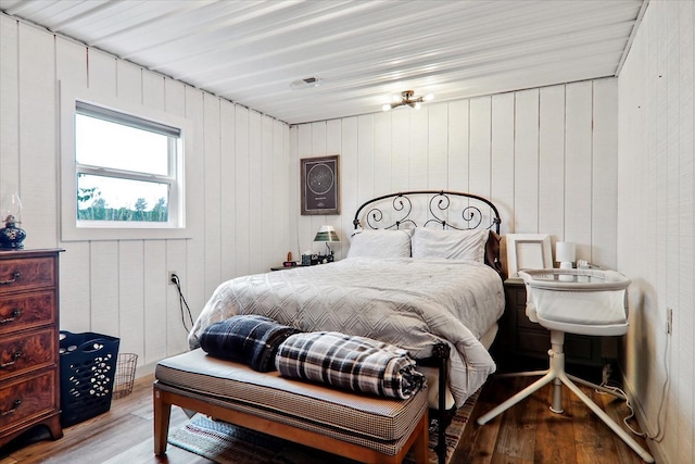 bedroom featuring hardwood / wood-style flooring