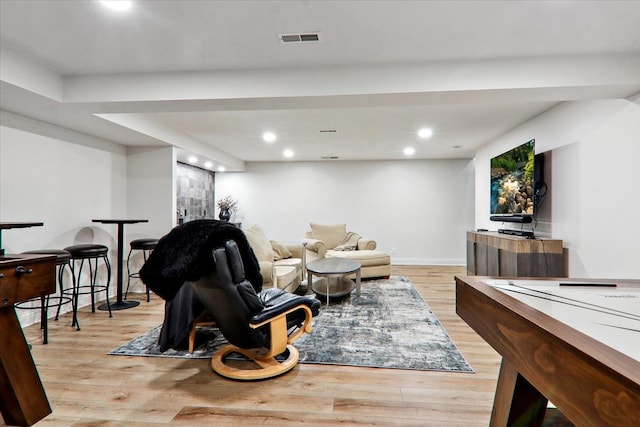 living room with light hardwood / wood-style floors