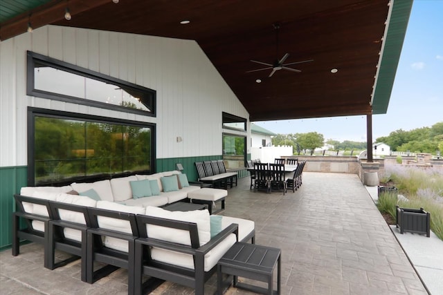 view of patio featuring an outdoor hangout area and ceiling fan