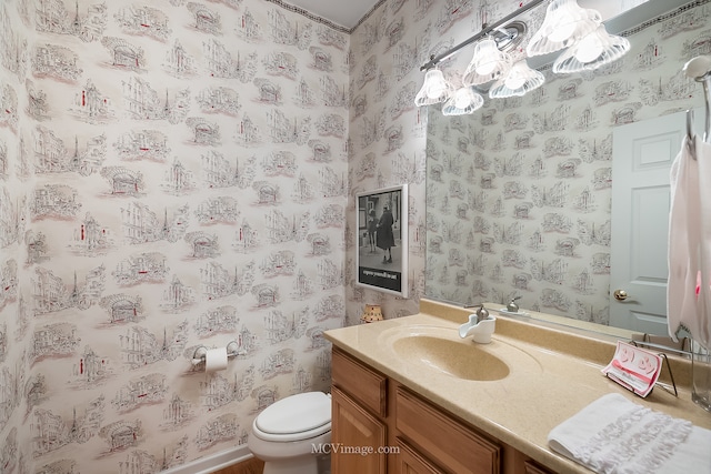 bathroom with vanity and toilet