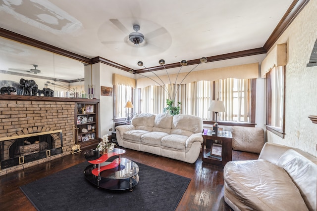 living room featuring dark wood-type flooring, a healthy amount of sunlight, and ceiling fan