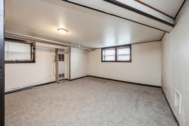 basement with light carpet