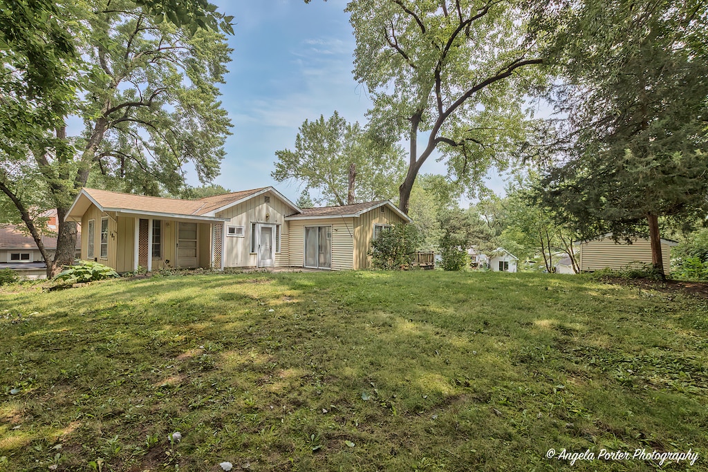 exterior space featuring a front lawn