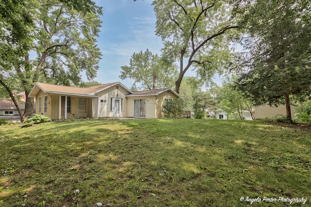 exterior space featuring a front lawn