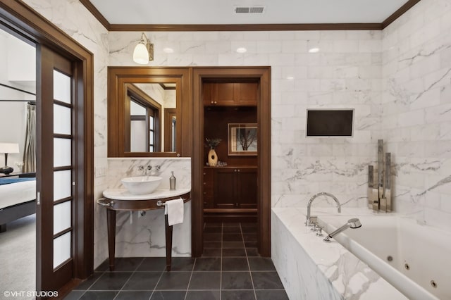 bathroom featuring tile walls, tiled bath, vanity, tile patterned flooring, and ornamental molding