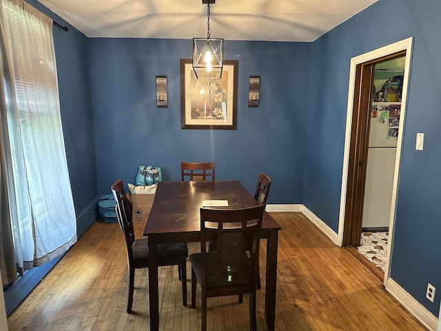 dining room featuring wood-type flooring