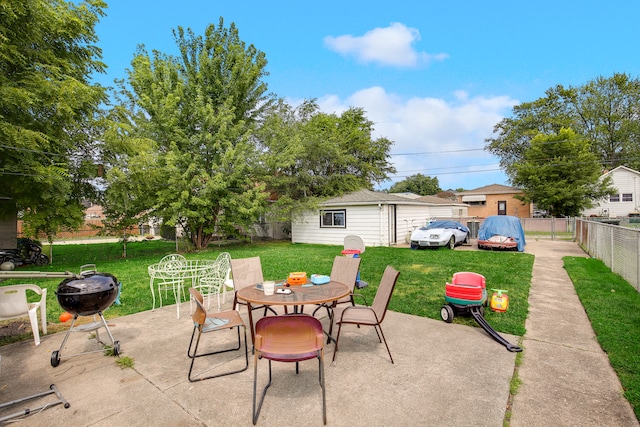 view of patio featuring an outbuilding and area for grilling